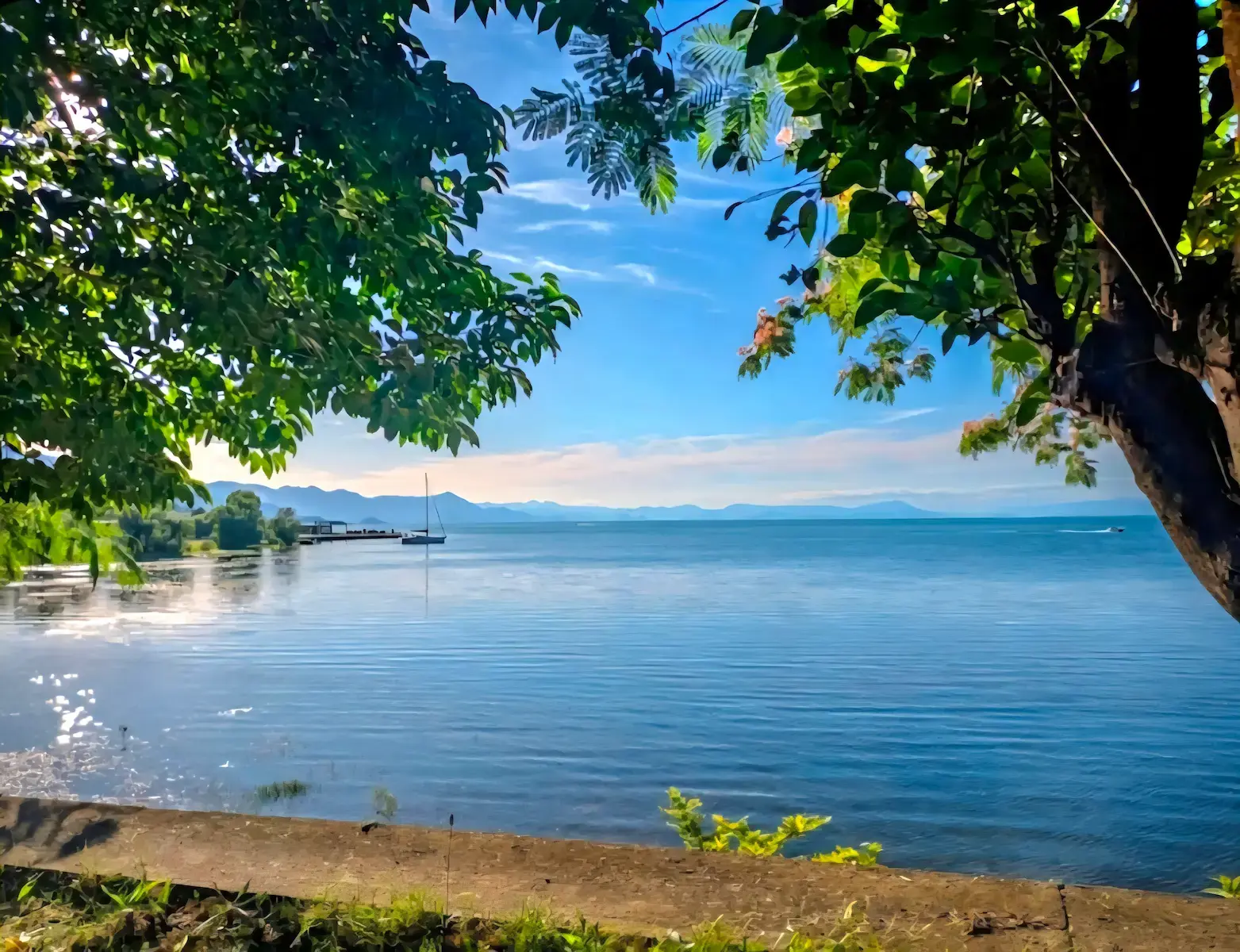 Biking along Lake Shkoder towards Shiroka