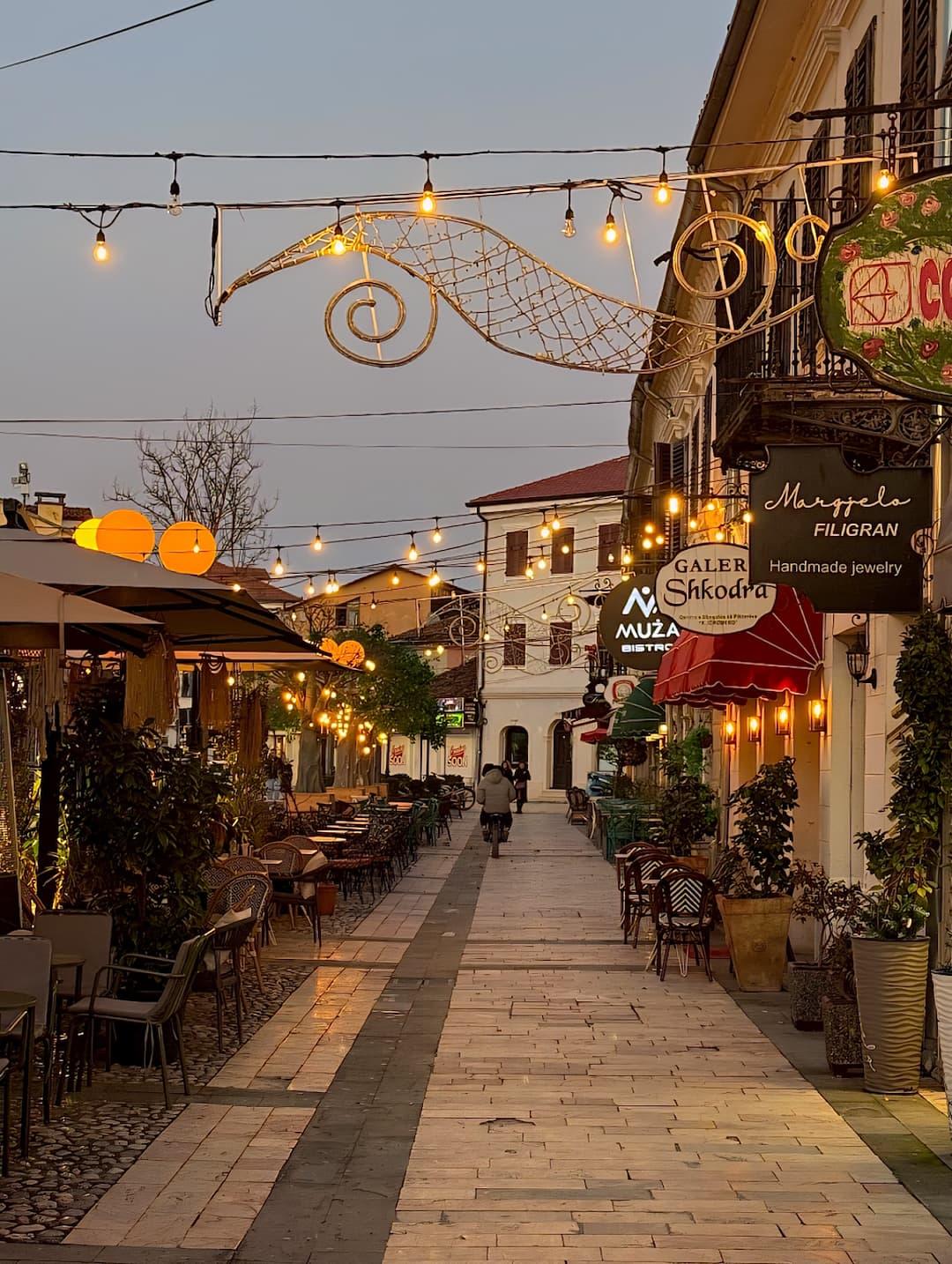 Pedestrian street scene near Scodrinon Hostel on Kolë Idromeno, Shkoder